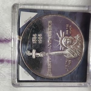 One Troy Ounce World Trade Silver Coin